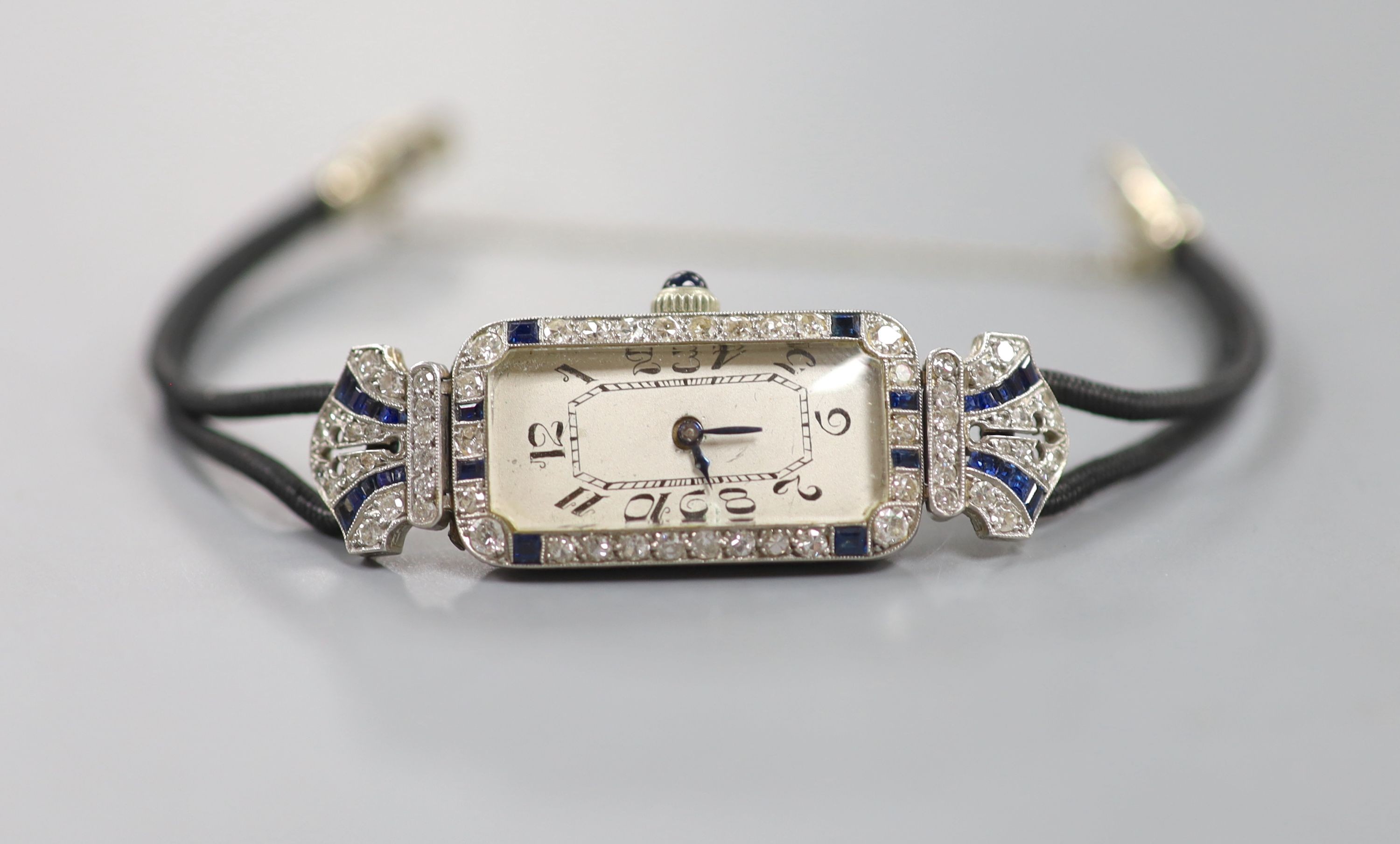 A lady's 1920's/1930's yellow and white metal, synthetic? sapphire and diamond set cocktail watch, - Image 2 of 3