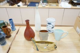 A group of six studio pottery vases and jugs to include-a Peter short tall bottle vase, a Peter