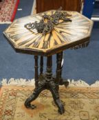 A 19th century Celanese carved ebony and coromandel veneered octagonal occasional table, width 57cm,