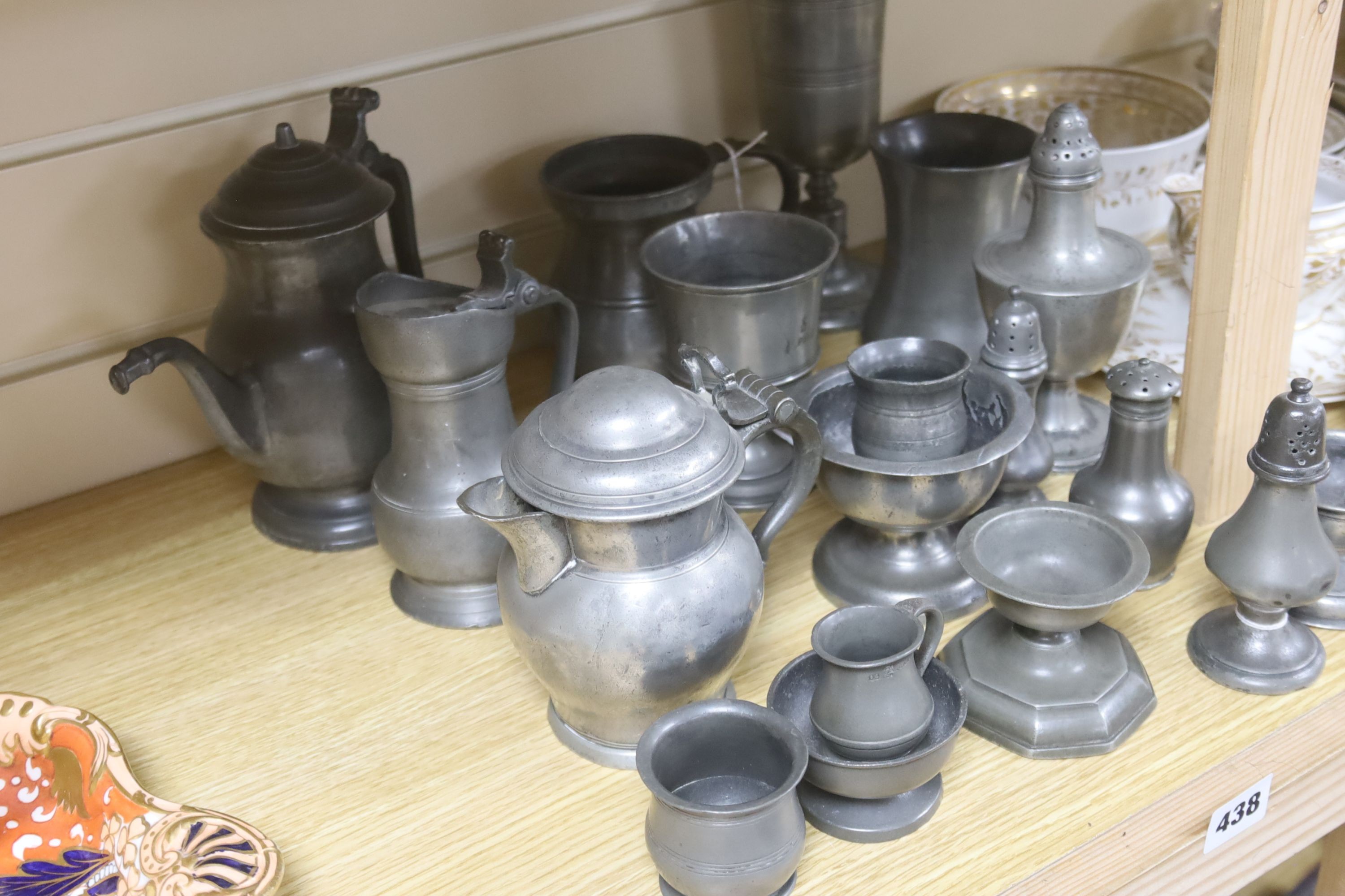 Eighteen items of 18th and 19th century pewter, including lidded jugs, measures, goblets, salt and - Image 2 of 2