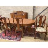 A Queen Anne style figured walnut dining suite comprising extending dining table, 200cm extended (