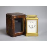 An early 20th century lacquered brass carriage clock, cased