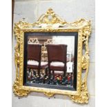 A Victorian gilt gesso wall mirror, width 58cm, height 66cm