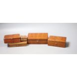 Five assorted boxes including two crocodile skin boxes by Finnigans, early 20th century, largest