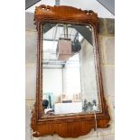 A George II walnut and parcel gilt fret cut wall mirror, width 46cm, height 88cm