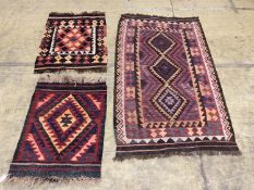 Three polychrome Kelim rugs, largest 180 x 100 cms