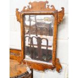 A George III style walnut fret cut wall mirror, width 47cm, height 66cm