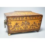 A 19th century rosewood and bird’s eye maple tea caddy, of sarcophagus form, the interior with