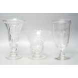 Three early 20th century cut and engraved glass vases25cm