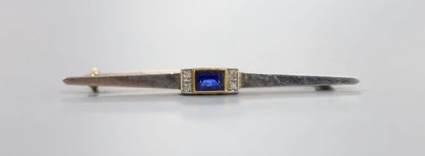 A 1930's/1940's yellow metal, synthetic sapphire and diamond chip set bar brooch, 55mm, gross weight