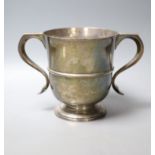 An Edwardian silver two handled trophy cup, with banded girdle, Robert Dicker, London, 1904,