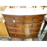 A Victorian mahogany bow fronted chest of drawers (lacking feet), width 105cm, depth 50cm, height