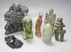 A group of Inuit and African stone carvings19cm