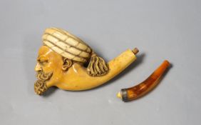 A late 19th century Meerschaum pipe of an Arab gentleman, 14cm