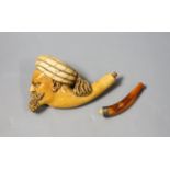 A late 19th century Meerschaum pipe of an Arab gentleman, 14cm