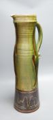 Clive Bowen (b.1943), a tall green glazed and brown slip decorated ewer,59cm