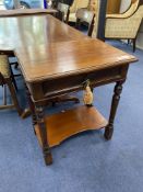 A small Victorian mahogany two tier side table, width 60cm, depth 43cm, height 72cm