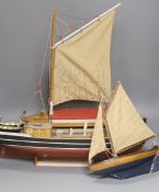 Two pond yachts and a model of a ship, longest 51.5 cm