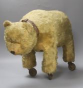 A blonde plush bear on wheels (put on later)55cm