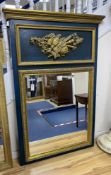 A 19th century French overmantel gilt and gesso mirror with musical themed emblem over on blue