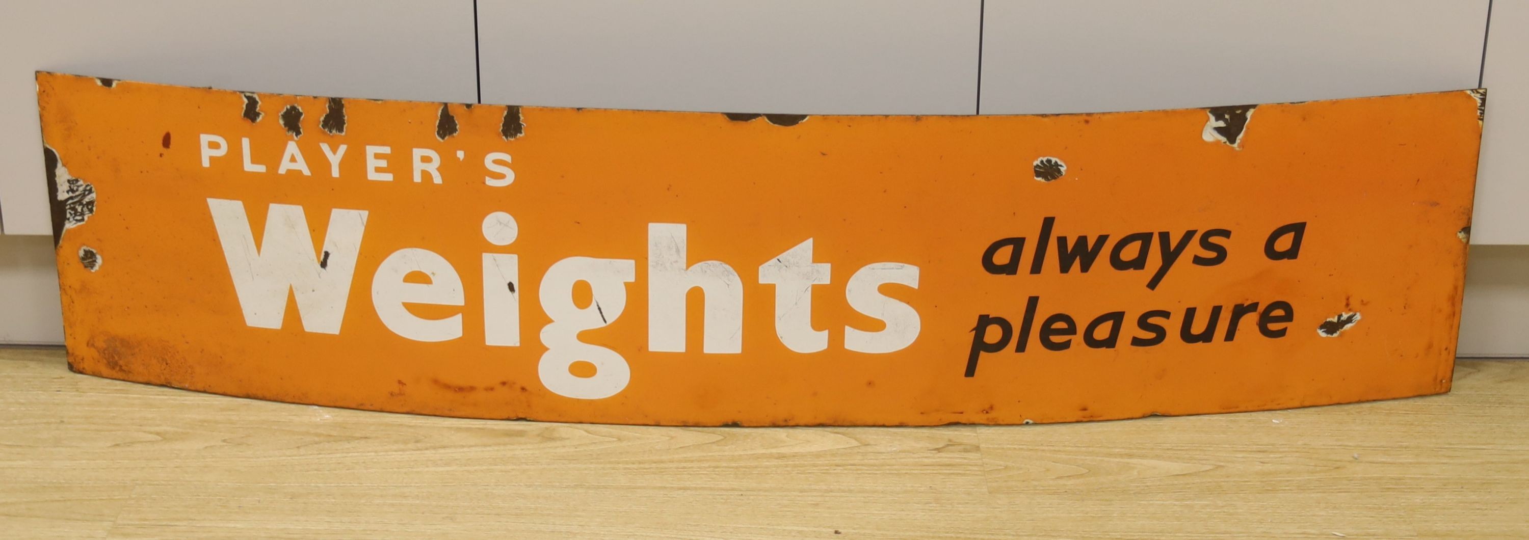 An enamel sign, Player's weights