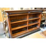 A 19th century Dutch mahogany and ebonised three-tier open bookcase of large proportions, length