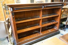 A 19th century Dutch mahogany and ebonised three-tier open bookcase of large proportions, length