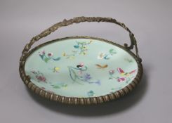 A 19th century Chinese celadon ground circular dish, with European bronze basket mount,polychrome-