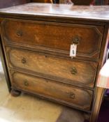 An 18th century style small oak chest,fitted three long drawers on bun feet, width 75cm, depth 47cm,