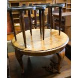 A circular burr walnut cabriole leg coffee table, diameter 84cm, height 47cm together with two