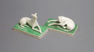 A pair of Staffordshire models of greyhounds, c.1830-50, each on rectangular bases, 10.2cm