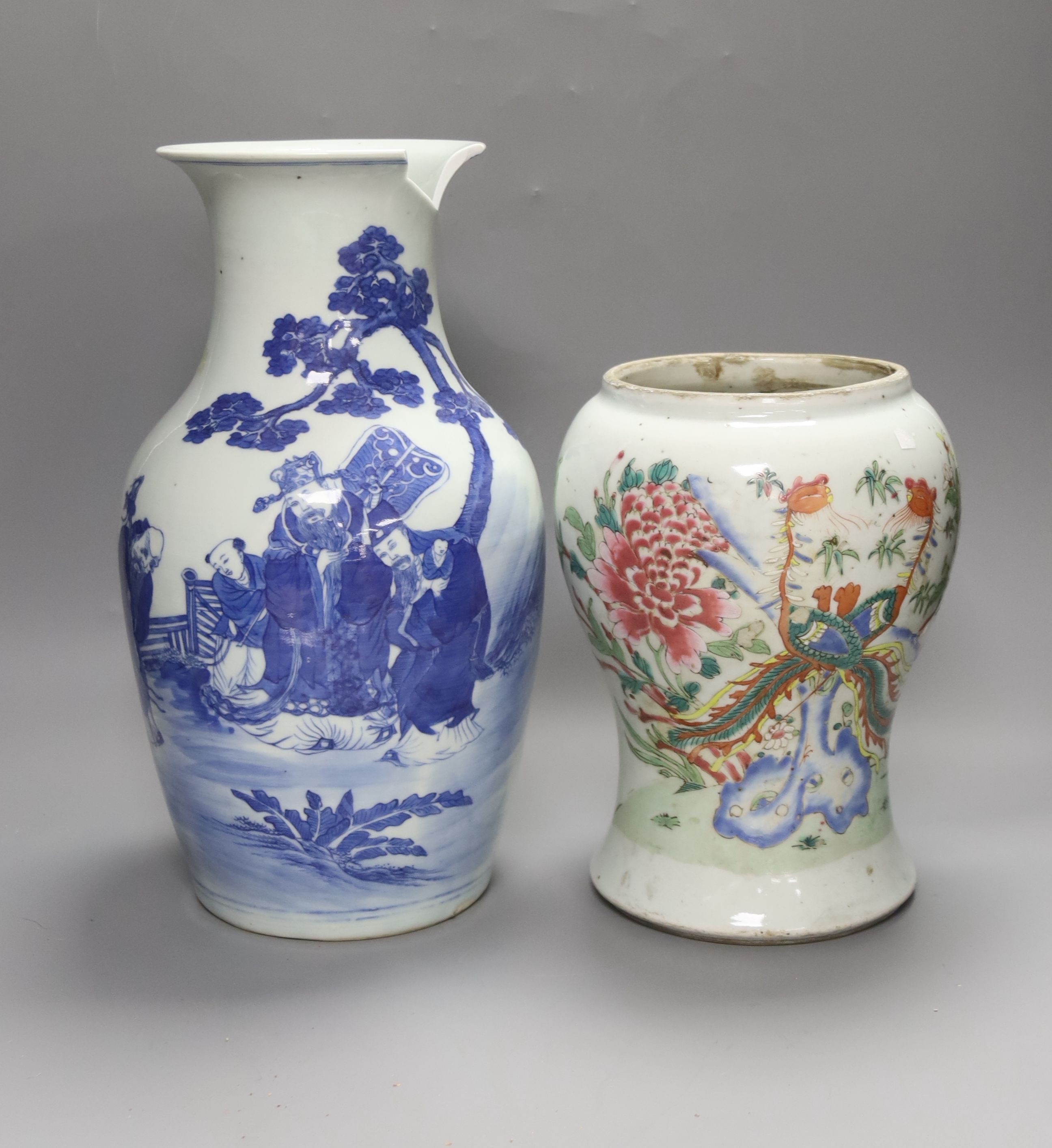 A Chinese blue and white 'Immortals' vase, 18th/19th century, damage, 34.5cm and a Chinese Yongzheng