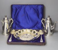 A quantity of plated items including cased dessert bowl and servers, cafe au lait pair and cased