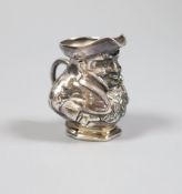 An Edwardian novelty silver cream jug modelled as a Toby jug, maker's mark rubbed, Birmingham, 1905,