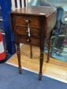 An early Victorian rosewood banded mahogany drop flap work table, width 34cm, depth 41cm, height