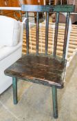 A painted primitive style comb back side chair, width 55cm, depth 45cm, height 94cm