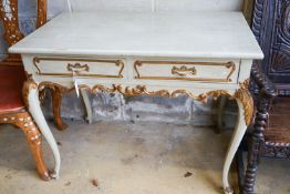 A late 19th century Italian painted and gilded two drawer side table, length 93cm, depth 53cm,