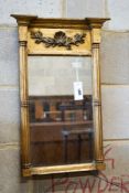 A small Regency giltwood and gesso pier glass, width 37cm, height 59cm