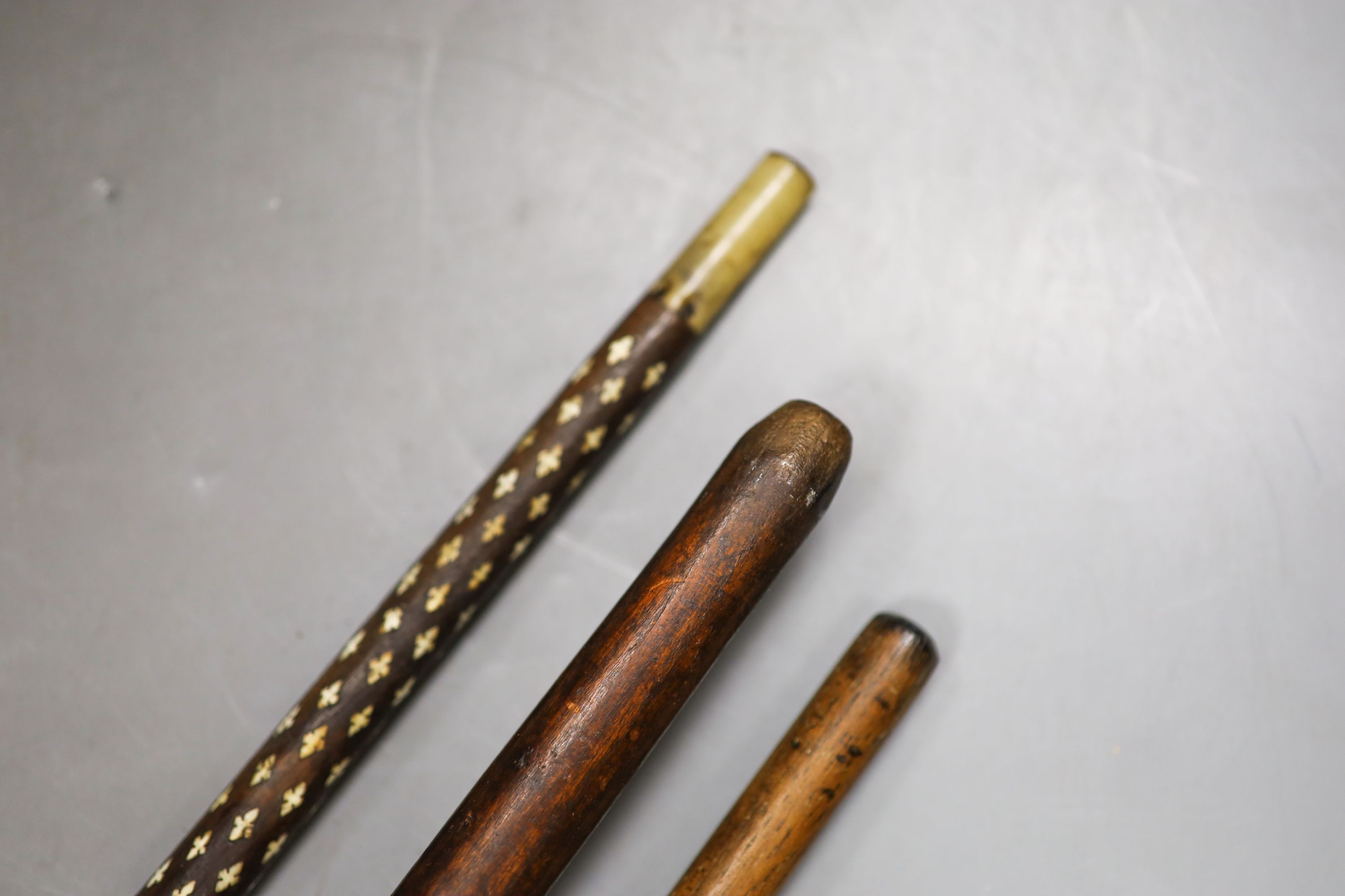 Three various walking canesIncluding two carved Ivory topped walking canes, one the cane in laid - Image 3 of 8