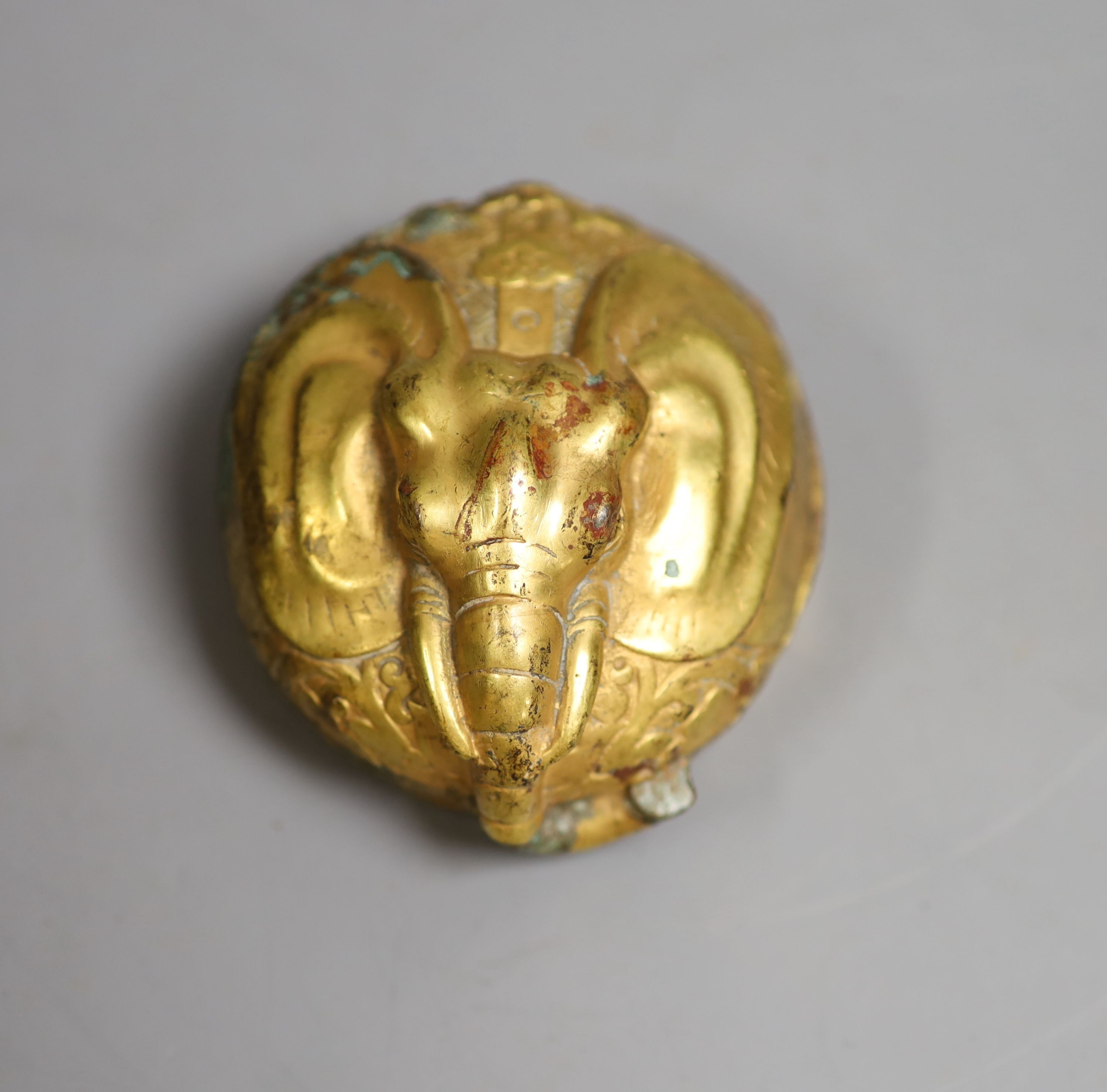 A Chinese gilt bronze elephant charm box, base 7cm diameter