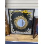 A large contemporary artwork on glass, with abstract pattern and centre mirror in frame, unsigned