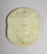 A Chinese pale celadon jade plaque, boy and bats, 5cm wide