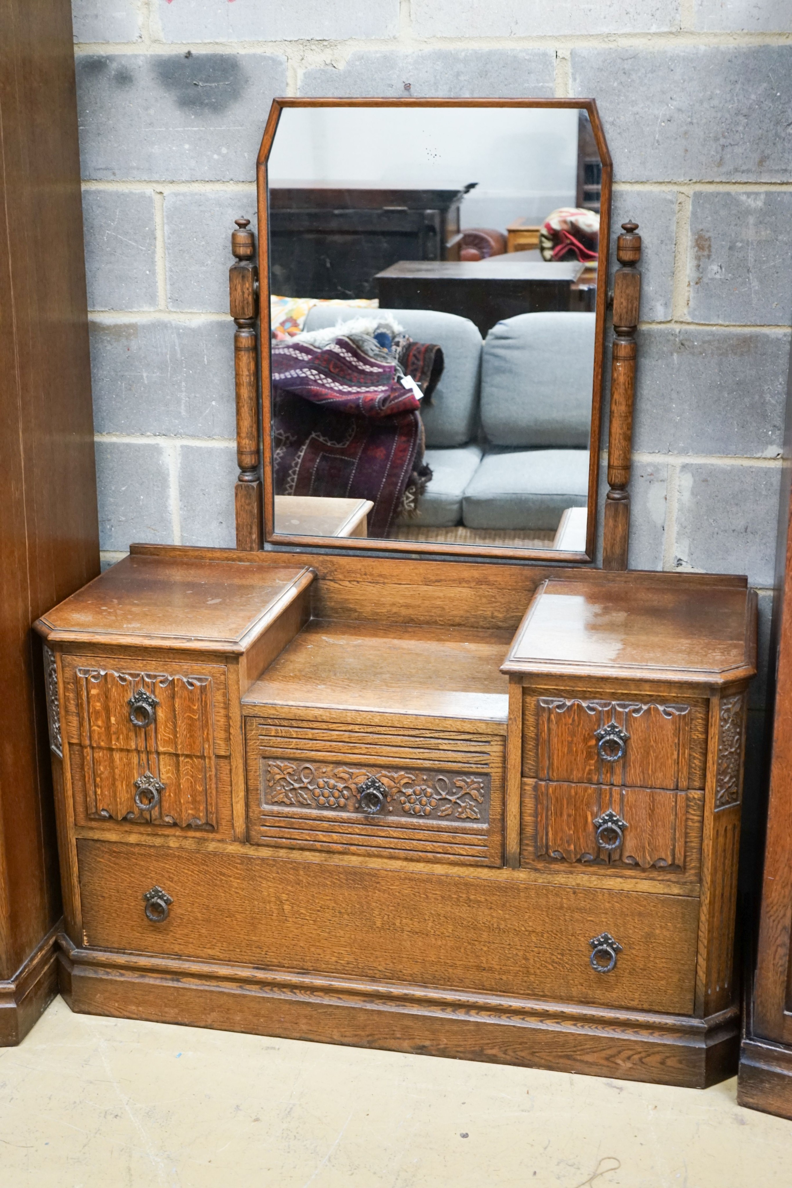 An early 20th century Jacobean revival linenfold moulded oak three piece bedroom suite, larger - Image 2 of 6