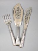 A pair of Victorian silver fish servers with loaded handles, Sheffield, 1853 and a Victorian