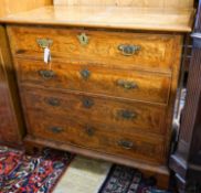 An 18th century burr walnut, banded and inlaid chest, possibly Dutch,oak-lined and fitted four