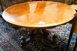 A mid-Victorian burr walnut-veneered circular tilt-top breakfast table, diameter 130cm, height 73cm