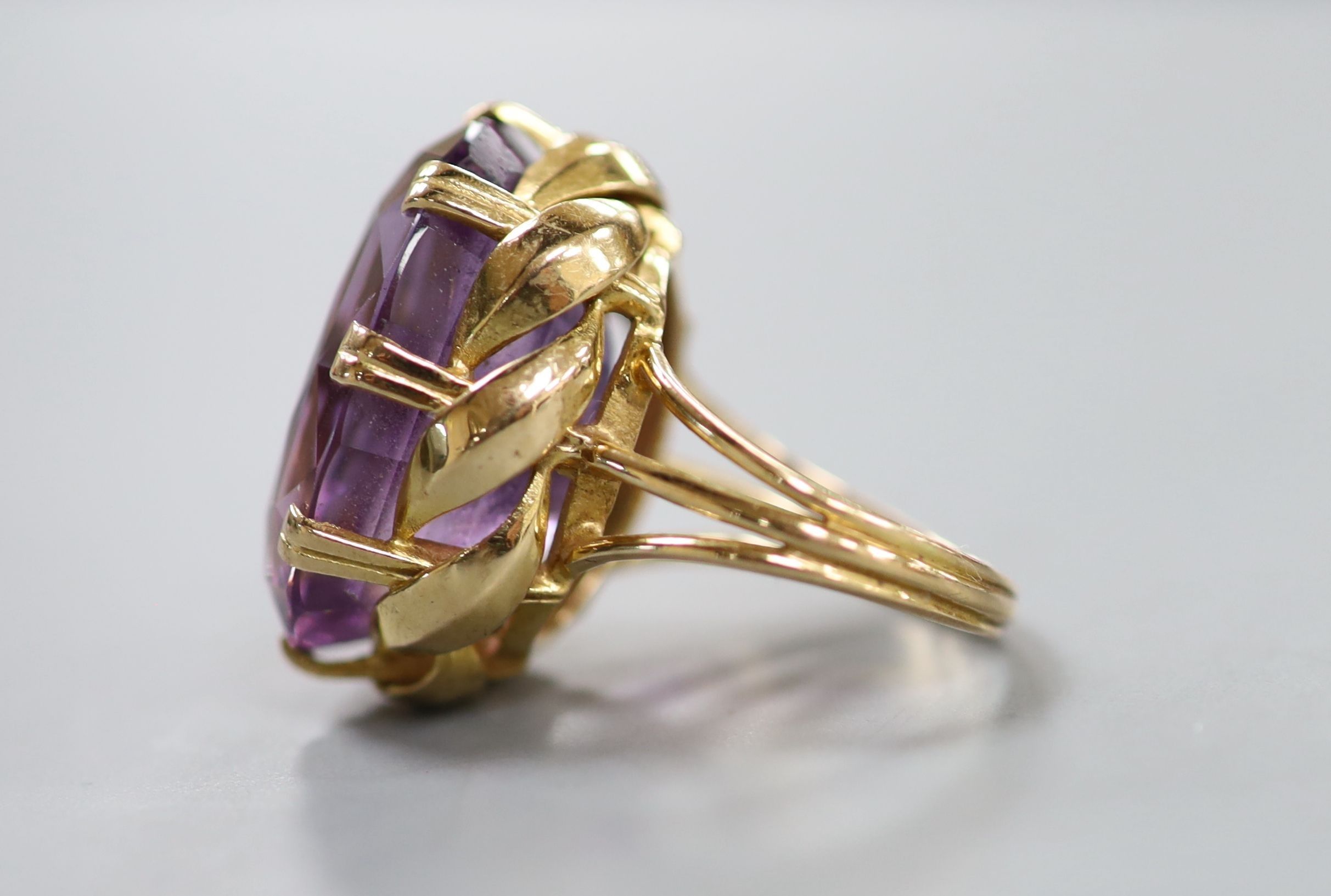 A yellow metal and oval cut amethyst set dress ring, size L, gross weight 11.5 grams. - Image 2 of 3
