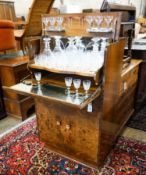 An Art Deco figured walnut and maple-lined cocktail cabinet, width 74cm, depth 41cm, height 121cm,