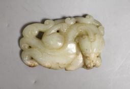 A Chinese pale celadon jade figure of a pixin, 11cm wide