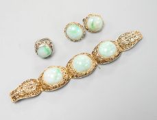 A Chinese filigree gilt white metal and three stone cabochon jade set bracelet, 17cm, a pair of